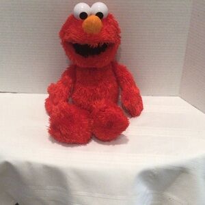 Sesame Street Tickle Me Elmo laughing & talking plush toy